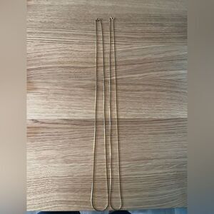 Two gold tone necklaces 29”